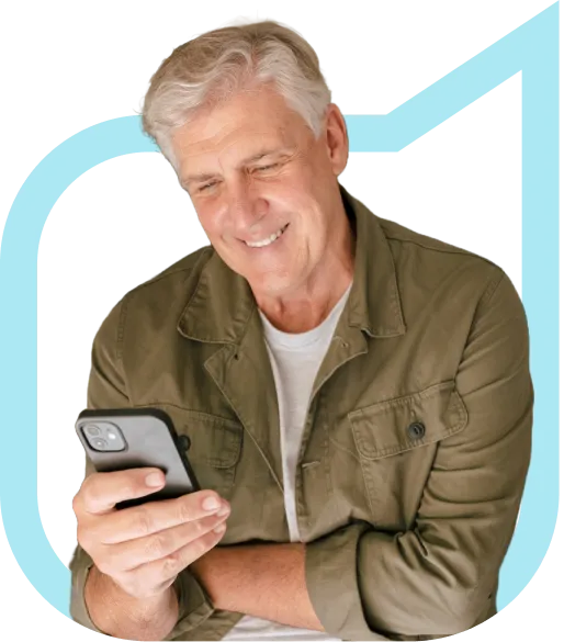 Smiling man on phone looking at pathology results